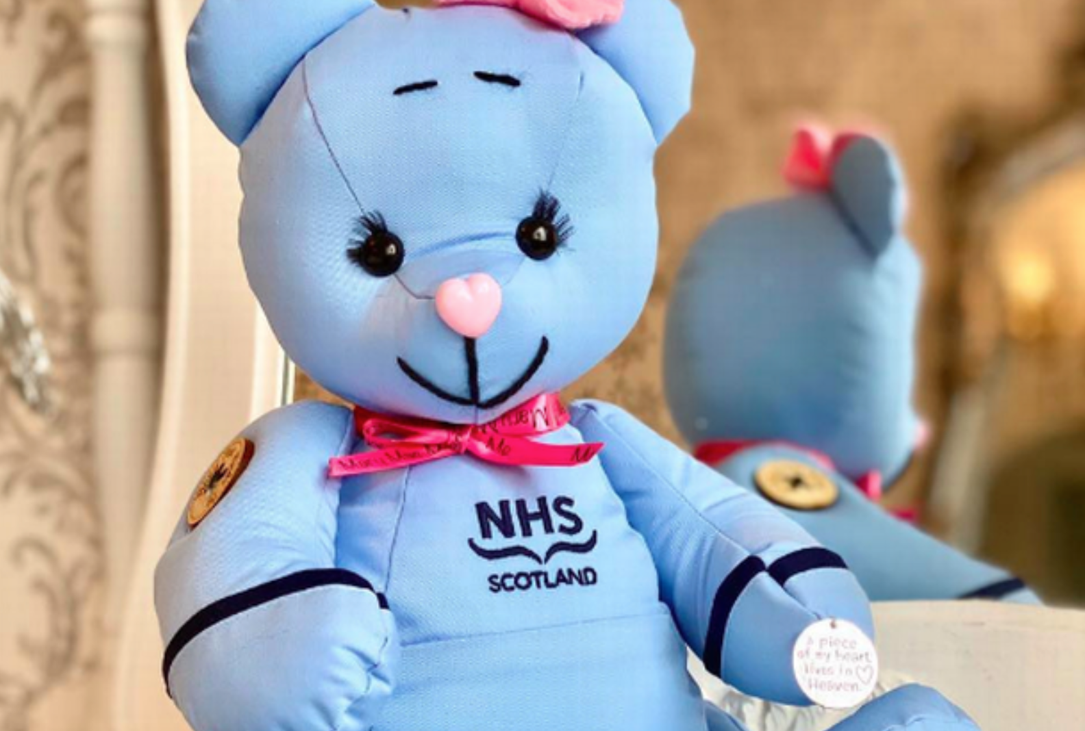 Teddy bears created from used nurses uniforms